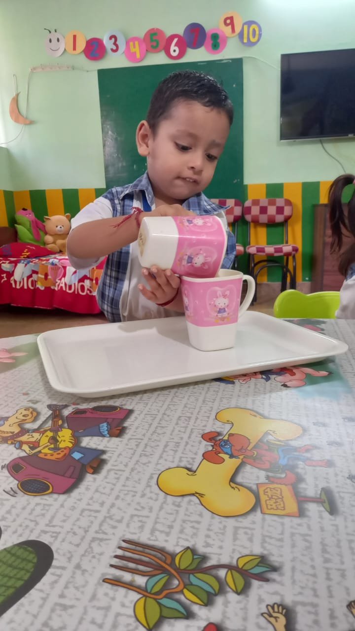Child learning with Montessori materials at Joyland Montessori School Chandigarh